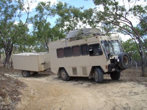 The bus and trailer in the bush